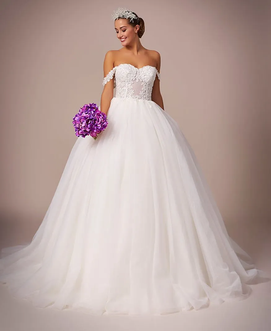 ---Alacuas – Princess-style wedding dress made of satin and tulle, the semi-rigid bustier is transparent--