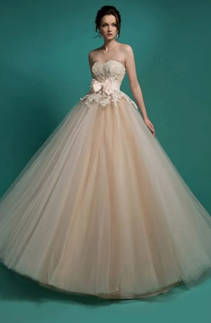 ---Champagne-colored tulle wedding dress A line style with lace bodice and wide tulle skirt trends 2021--