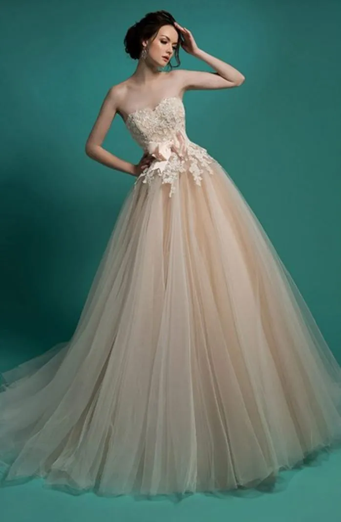 ---Champagne-colored tulle wedding dress A line style with lace bodice and wide tulle skirt trends 2021--