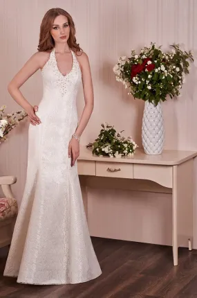 ---Elegant mermaid wedding dress with halter neckline made in lace decorated with embroidery, beads and sequins on the neckline-